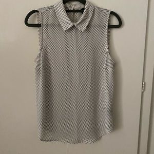 White and black polka dot blouse